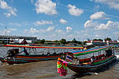 Bangkok - Tourist boats at Tha Thien pier along the Chao Praya River.